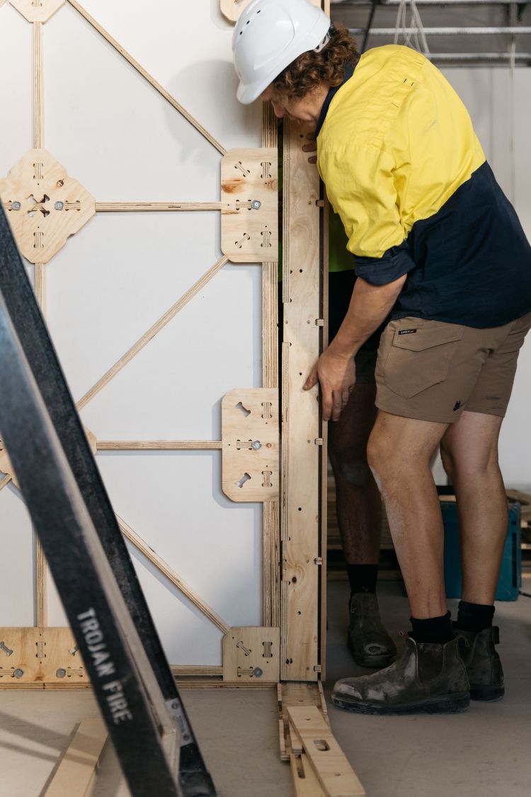 XFrame being assembled by man in hard hat