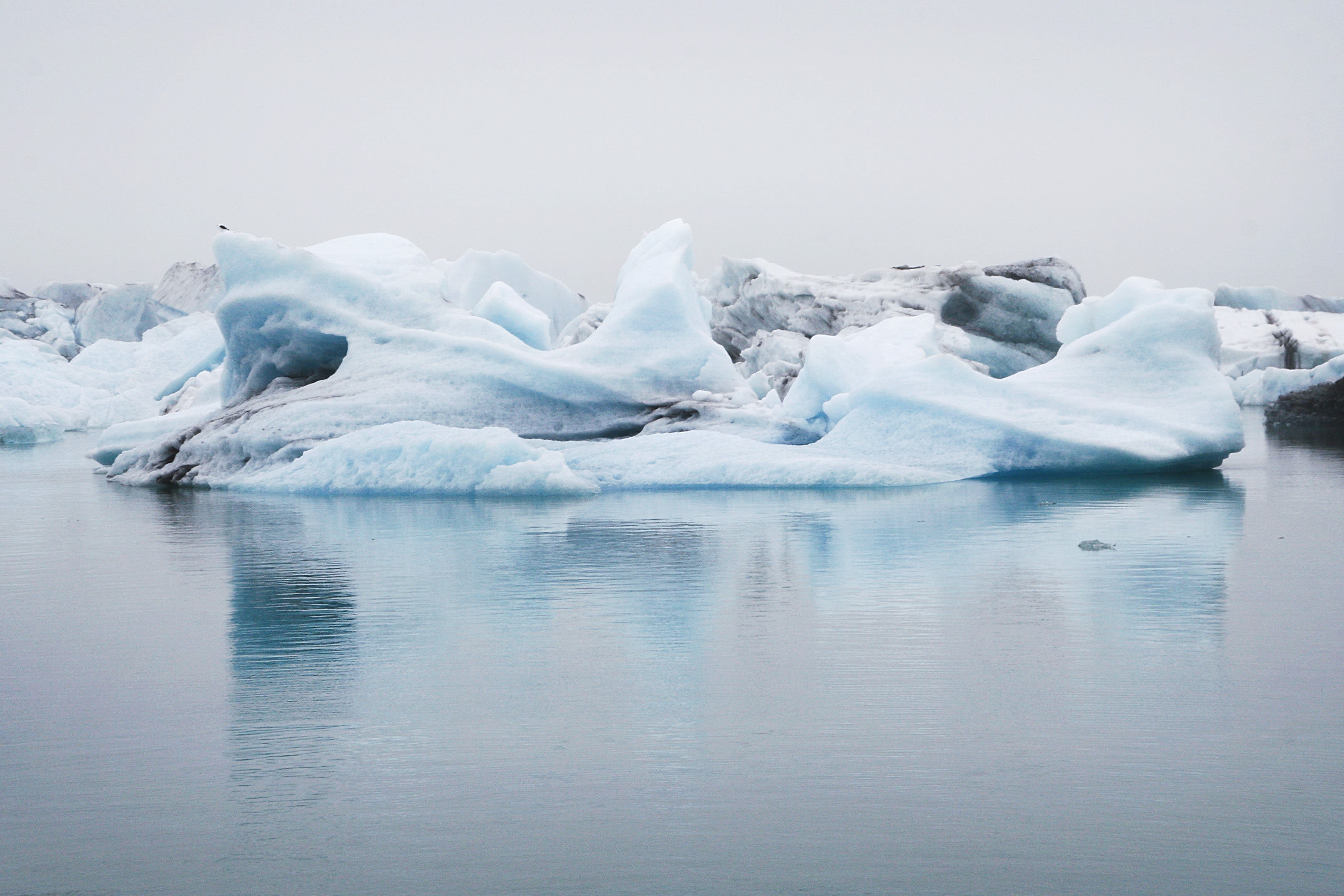 Iceberg floating on still water