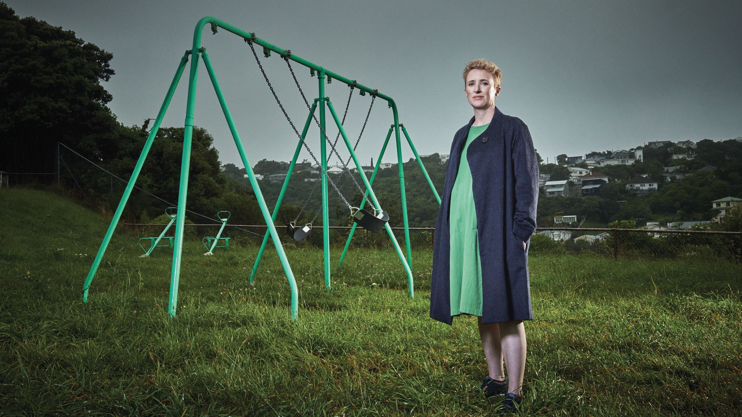 Professor Elizabeth Stanley standing in front of a swing set in a park in Miramar, Wellington